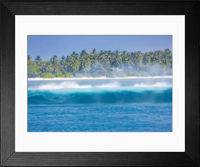 Framed Print : Tropical island with waves splashing. Tropical sea, palm trees and blue sky Framed Print : Tropical island with waves splashing. Tropical sea, palm trees and blue sky
