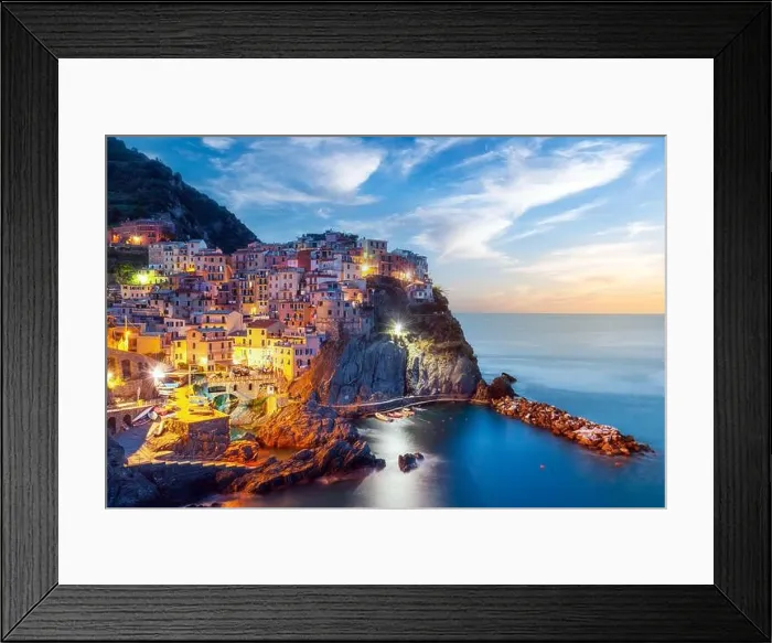 Framed Print : Incredible morning view of Manarola city with costal rocks on a foreground. Cinque Terre National Park, Liguria, Italy, Europe. Landscape photography Framed Print : Incredible morning view of Manarola city with costal rocks on a foreground. Cinque Terre National Park, Liguria, Italy, Europe. Landscape photography