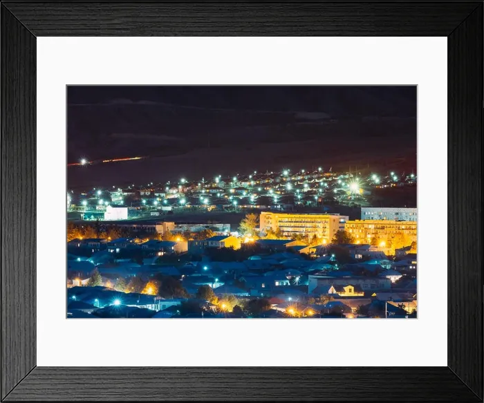 Framed Print : Gori, Shida Kartli Region, Georgia. Cityscape With Night Streets In Bright Yellow Evening Illumination In Twilight. Aerial View Of City Framed Print : Gori, Shida Kartli Region, Georgia. Cityscape With Night Streets In Bright Yellow Evening Illumination In Twilight. Aerial View Of City