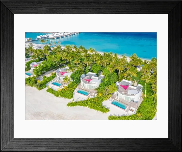 Framed Print : Perfect aerial landscape, luxury tropical resort or hotel with water villas and beautiful beach scenery. Amazing bird eyes view in Maldives, landscape Framed Print : Perfect aerial landscape, luxury tropical resort or hotel with water villas and beautiful beach scenery. Amazing bird eyes view in Maldives, landscape