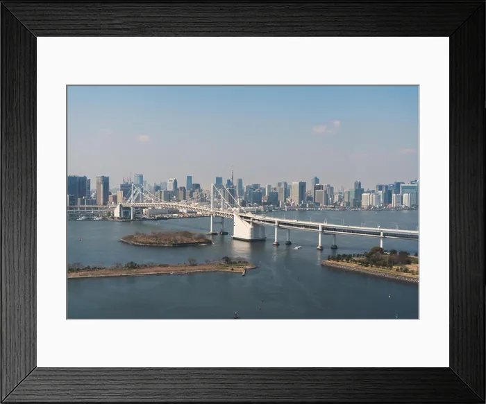 Framed Print : Tokyo Bay with a view of the Tokyo skyline and Rainbow Bridge in tokyo, Japan Framed Print : Tokyo Bay with a view of the Tokyo skyline and Rainbow Bridge in tokyo, Japan