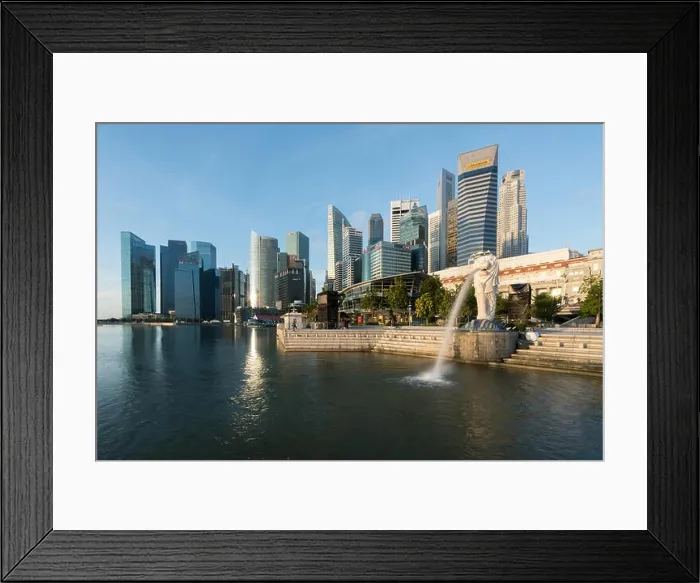 Framed Print : SINGAPORE - FEBRUARY 27, 2017 : Merlion statue fountain with Singapore business district skyline with sunrise in morning at Marina Bay, Singapore Framed Print : SINGAPORE - FEBRUARY 27, 2017 : Merlion statue fountain with Singapore business district skyline with sunrise in morning at Marina Bay, Singapore