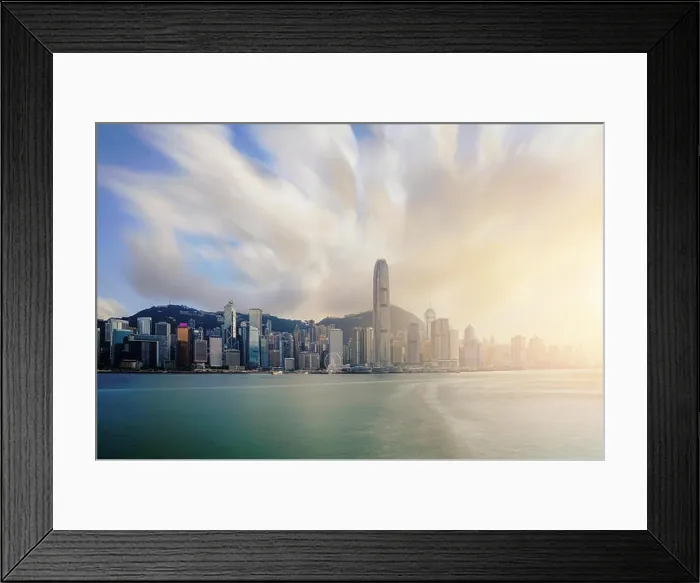 Framed Print : View of Victoria Harbour with Hong Kong skyscraper office buildings at sunset time in Hong Kong. Asia Framed Print : View of Victoria Harbour with Hong Kong skyscraper office buildings at sunset time in Hong Kong. Asia