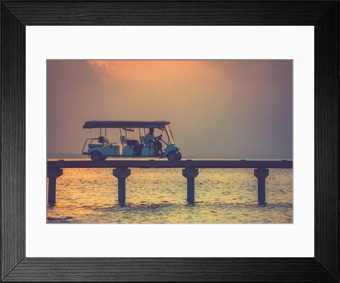 Framed Print : Golf cart at Maldives island at Luxury resort villas, sunset landscape Framed Print : Golf cart at Maldives island at Luxury resort villas, sunset landscape