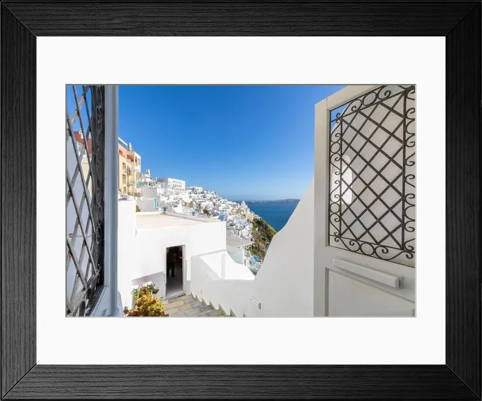 Framed Print : White architecture on Santorini island, Greece. Beautiful landscape, sea view. White wash staircases on Santorini Island, Greece. The view off Caldera Framed Print : White architecture on Santorini island, Greece. Beautiful landscape, sea view. White wash staircases on Santorini Island, Greece. The view off Caldera