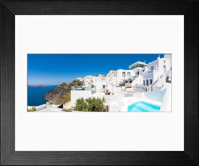 Framed Print : Beautiful panoramic view of picturesque town in Santorini, caldera and volcano on the Mediterranean Sea. Traditional white architecture holiday island Framed Print : Beautiful panoramic view of picturesque town in Santorini, caldera and volcano on the Mediterranean Sea. Traditional white architecture holiday island