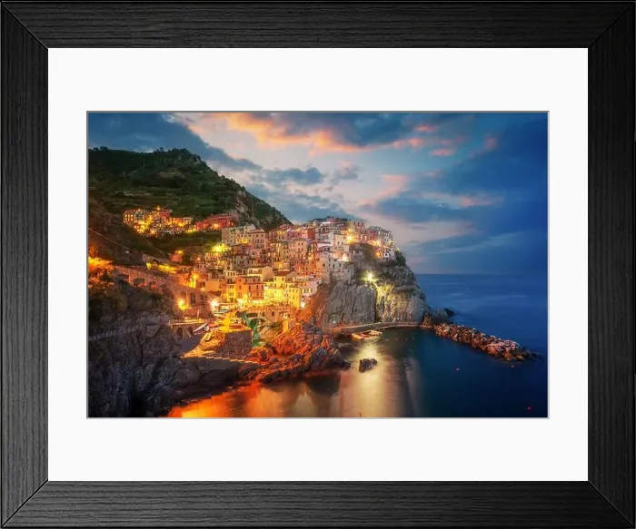 Framed Print : Fantastic morning view of Manarola city with costal rocks on a foreground. Cinque Terre National Park, Liguria, Italy, Europe. Landscape photography Framed Print : Fantastic morning view of Manarola city with costal rocks on a foreground. Cinque Terre National Park, Liguria, Italy, Europe. Landscape photography