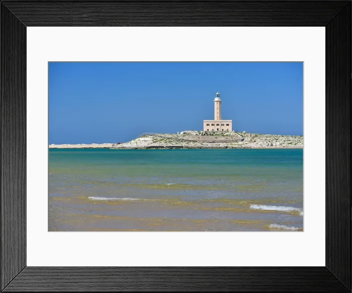 Framed Print : Lighthouse from the coast of Vieste on a sunny day, Puglia region, Italy Framed Print : Lighthouse from the coast of Vieste on a sunny day, Puglia region, Italy