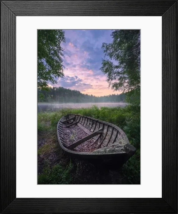 Framed Print : Beautiful sunrise in tranquil lake at summer evening in Finland with wooden boat Framed Print : Beautiful sunrise in tranquil lake at summer evening in Finland with wooden boat