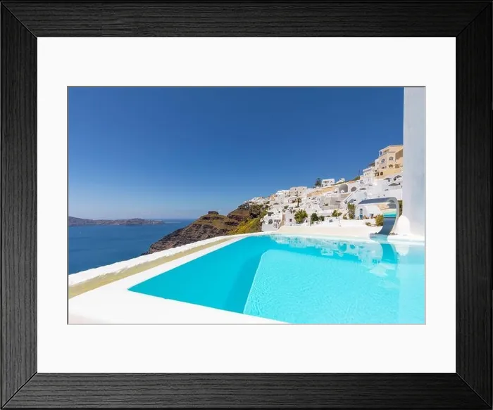 Framed Print : Swimming poolside, infinity pool relaxation view out over the sea caldera of Santorini Greece. Luxury travel, summer holiday vacation, peaceful resort Framed Print : Swimming poolside, infinity pool relaxation view out over the sea caldera of Santorini Greece. Luxury travel, summer holiday vacation, peaceful resort