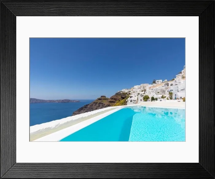 Framed Print : Swimming poolside, infinity pool relaxation view out over the sea caldera of Santorini Greece. Luxury travel, summer holiday vacation, peaceful resort Framed Print : Swimming poolside, infinity pool relaxation view out over the sea caldera of Santorini Greece. Luxury travel, summer holiday vacation, peaceful resort