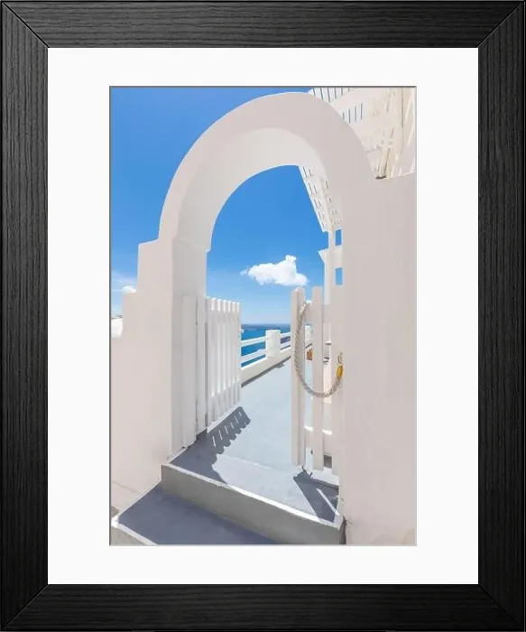 Framed Print : White wash staircases on Santorini Island Greece. Door entrance over blue sea view under blue sky. Amazing summer travel landscape. Exotic destination Framed Print : White wash staircases on Santorini Island Greece. Door entrance over blue sea view under blue sky. Amazing summer travel landscape. Exotic destination