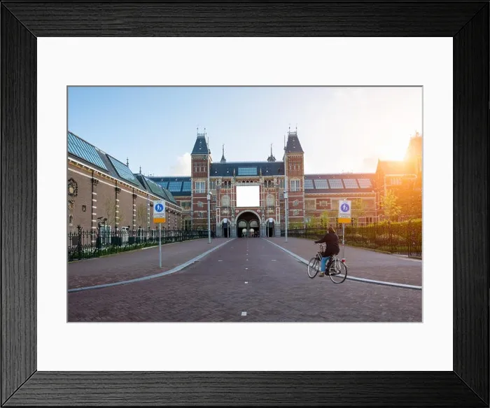 Framed Print : People on bicycles passing by Rijksmuseum (Netherlands National state museum) in Amsterdam, Netherlands. Bicycle - the main means of transportation in Framed Print : People on bicycles passing by Rijksmuseum (Netherlands National state museum) in Amsterdam, Netherlands. Bicycle - the main means of transportation in