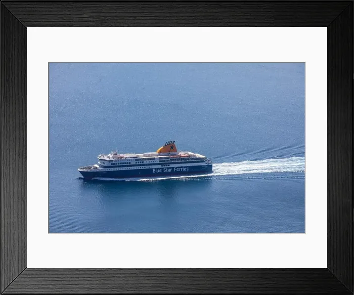 Framed Print : Santorini, Greece - 10.8.2019: Tourists arriving with ferries running on Aegeans sea at Santorini island, Greece
