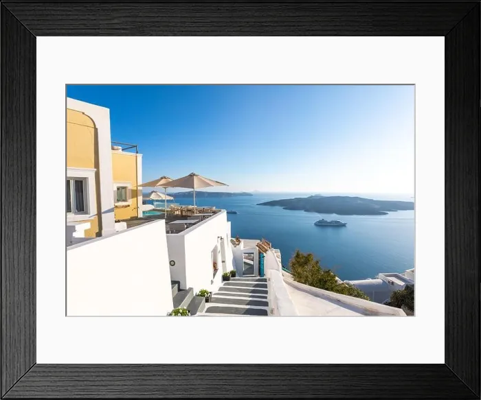 Framed Print : Amazing street view Santorini island. Greece traditional white and blue architecture, sea view and fantastic summer mood vibes. Luxury travel holiday Framed Print : Amazing street view Santorini island. Greece traditional white and blue architecture, sea view and fantastic summer mood vibes. Luxury travel holiday