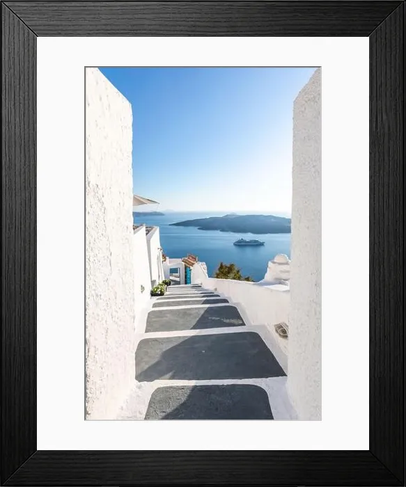Framed Print : Amazing street view Santorini island. Greece traditional white and blue architecture, sea view and fantastic summer mood vibes. Luxury travel holiday Framed Print : Amazing street view Santorini island. Greece traditional white and blue architecture, sea view and fantastic summer mood vibes. Luxury travel holiday