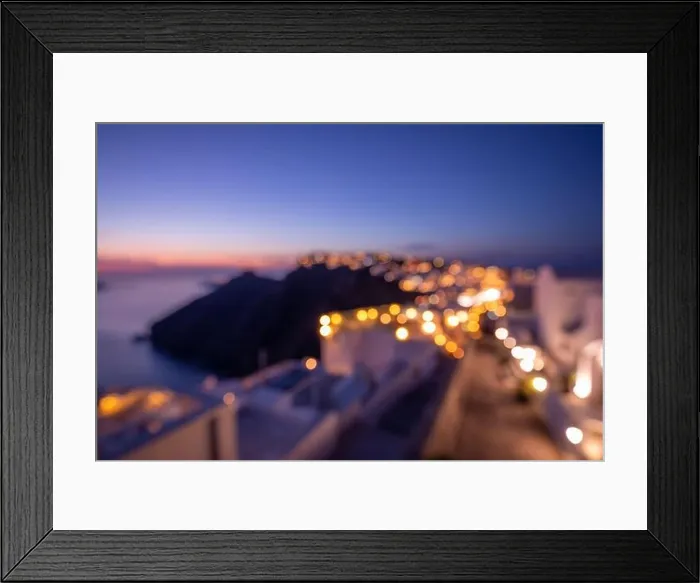 Framed Print : World environment day concept: Bokeh light and blur of sunset twilight town on Santorini, Greece. Sea view and island landscape, abstract cityscape Framed Print : World environment day concept: Bokeh light and blur of sunset twilight town on Santorini, Greece. Sea view and island landscape, abstract cityscape