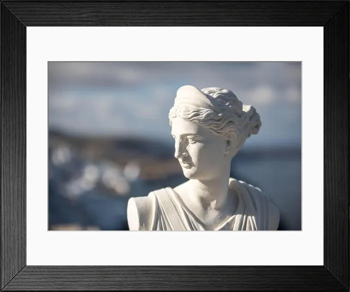 Framed Print : White statue and sea caldera view Santorini, Greece. Famous attraction of white village with cobbled streets, Greek Cyclades Islands, Aegean Sea Framed Print : White statue and sea caldera view Santorini, Greece. Famous attraction of white village with cobbled streets, Greek Cyclades Islands, Aegean Sea