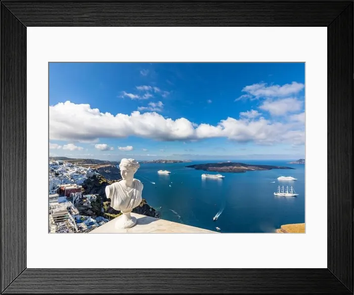 Framed Print : Peaceful view in Santorini, Greece with white architecture and pink flowers, cruise ships, Mediterranean summer mood, vacation and travel background Framed Print : Peaceful view in Santorini, Greece with white architecture and pink flowers, cruise ships, Mediterranean summer mood, vacation and travel background