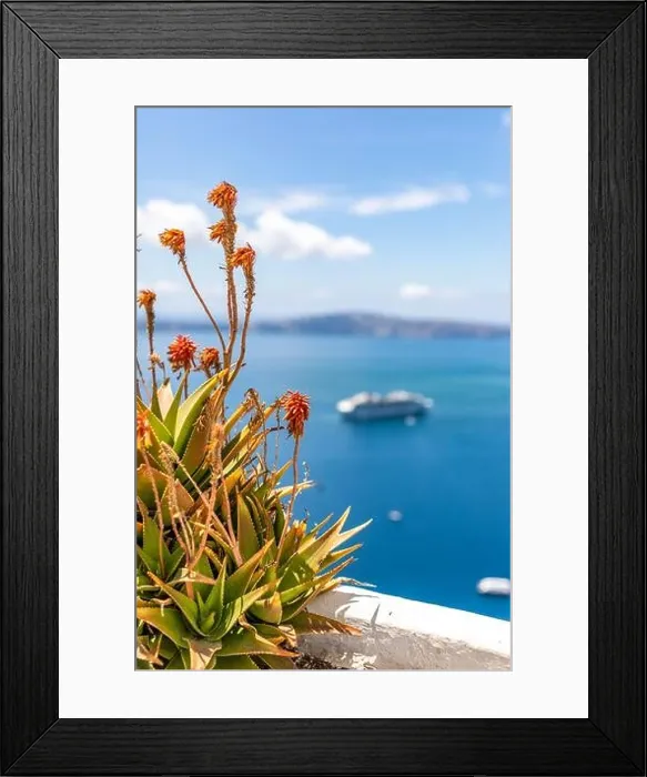 Framed Print : Peaceful view in Santorini, Greece with white architecture and pink flowers, cruise ships, Mediterranean summer mood, vacation and travel background Framed Print : Peaceful view in Santorini, Greece with white architecture and pink flowers, cruise ships, Mediterranean summer mood, vacation and travel background