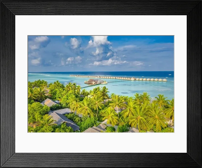 Framed Print : Aerial landscape, luxury tropical resort or hotel with water villas and beautiful beach scenery. Amazing bird eyes view in Maldives landscape seascape Framed Print : Aerial landscape, luxury tropical resort or hotel with water villas and beautiful beach scenery. Amazing bird eyes view in Maldives landscape seascape