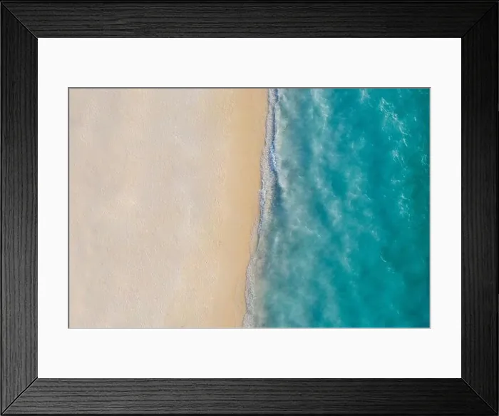 Framed Print : Aerial view of sandy beach and ocean with waves. Beautiful tropical white empty beach and sea waves seen from above. Beautiful sea landscape beach Framed Print : Aerial view of sandy beach and ocean with waves. Beautiful tropical white empty beach and sea waves seen from above. Beautiful sea landscape beach