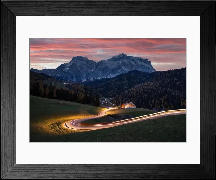 Framed Print : Glowing road at the autumn Dolomite Alps. Amazing landscape with lighting road and snowy mountains on background at San Genesio village location Framed Print : Glowing road at the autumn Dolomite Alps. Amazing landscape with lighting road and snowy mountains on background at San Genesio village location
