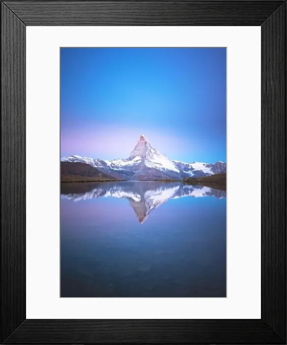 Framed Print : Picturesque landscape with colorful sunrise on Stellisee lake. Snowy Matterhorn Cervino peak with reflection in clear water. Zermatt, Swiss Alps Framed Print : Picturesque landscape with colorful sunrise on Stellisee lake. Snowy Matterhorn Cervino peak with reflection in clear water. Zermatt, Swiss Alps