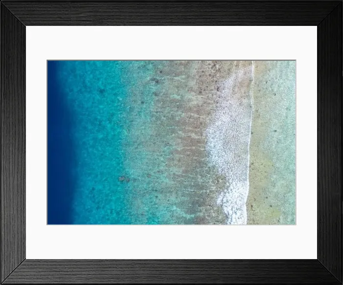Framed Print : Top view aerial photo from flying drone. Beautiful beach. Aerial view of calm waves, breaking at coral reef. Exotic ocean beach, tropical landscape Framed Print : Top view aerial photo from flying drone. Beautiful beach. Aerial view of calm waves, breaking at coral reef. Exotic ocean beach, tropical landscape