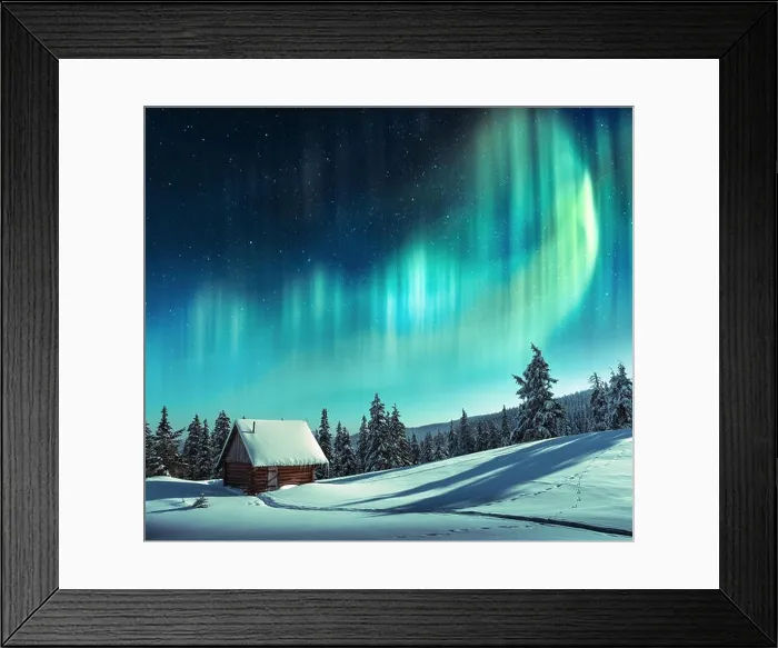 Framed Print : Fantastic winter landscape with wooden house in snowy mountains and northen light in night sky Framed Print : Fantastic winter landscape with wooden house in snowy mountains and northen light in night sky