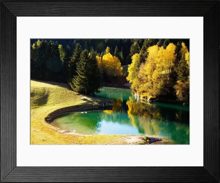 Framed Print : Sunny autumn view of Soraga lake in Soraga di Fassa village, Province of Trento, Italy, Dolomite Alps. Landscape photography