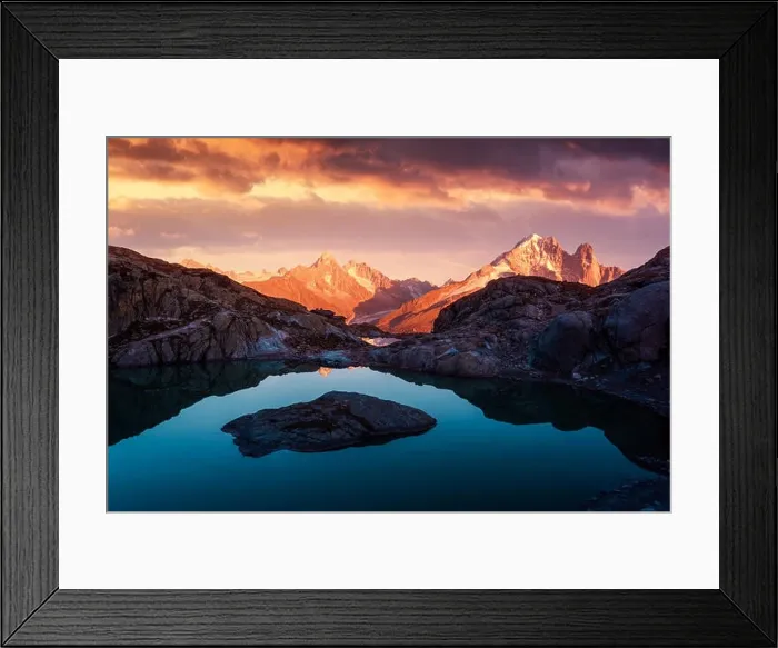Framed Print : Colourful sunset on Lac Blanc lake in France Alps. Monte Bianco mountain range on background Framed Print : Colourful sunset on Lac Blanc lake in France Alps. Monte Bianco mountain range on background