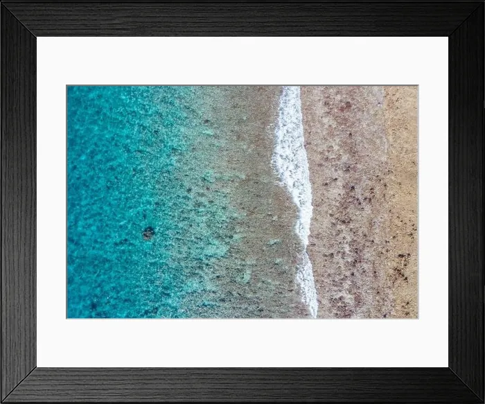 Framed Print : Top view aerial photo from flying drone. Beautiful beach. Aerial view of calm waves, breaking at coral reef. Exotic ocean beach, tropical landscape Framed Print : Top view aerial photo from flying drone. Beautiful beach. Aerial view of calm waves, breaking at coral reef. Exotic ocean beach, tropical landscape