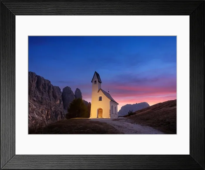 Framed Print : Incredible view on small iIlluminated chapel - Kapelle Ciapela on Gardena Pass, Italian Dolomites mountains. Colorful sunset in Dolomite Alps, Italy