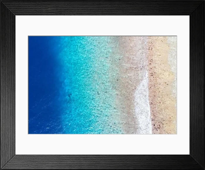 Framed Print : Top view aerial photo from flying drone. Beautiful beach. Aerial view of calm waves, breaking at coral reef. Exotic ocean beach, tropical landscape Framed Print : Top view aerial photo from flying drone. Beautiful beach. Aerial view of calm waves, breaking at coral reef. Exotic ocean beach, tropical landscape