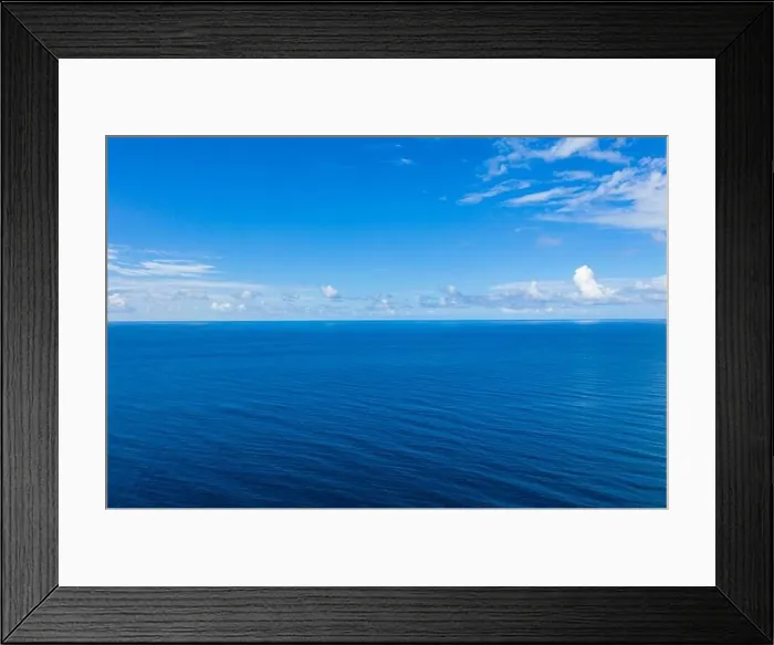 Framed Print : Seascape with sea horizon and almost clear deep blue sky background. Perfect sky and water, endless ocean view, blue color. Soft waves, surf concept Framed Print : Seascape with sea horizon and almost clear deep blue sky background. Perfect sky and water, endless ocean view, blue color. Soft waves, surf concept