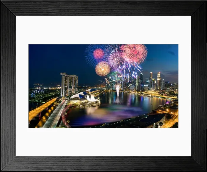 Framed Print : Aerial view of Fireworks celebration over Marina bay in Singapore. New year day 2018 or National day celebration at Singapore. Asia Framed Print : Aerial view of Fireworks celebration over Marina bay in Singapore. New year day 2018 or National day celebration at Singapore. Asia