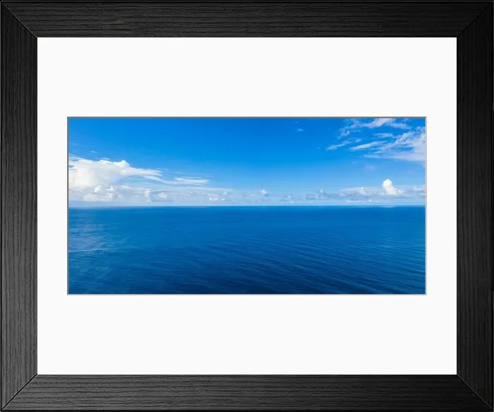 Framed Print : Seascape with sea horizon and almost clear deep blue sky background. Perfect sky and water, endless ocean view, blue color. Soft waves, surf concept Framed Print : Seascape with sea horizon and almost clear deep blue sky background. Perfect sky and water, endless ocean view, blue color. Soft waves, surf concept