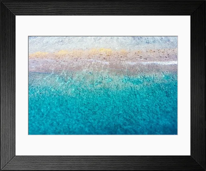 Framed Print : Top view aerial photo from flying drone. Beautiful beach. Aerial view of calm waves, breaking at coral reef. Exotic ocean beach, tropical landscape Framed Print : Top view aerial photo from flying drone. Beautiful beach. Aerial view of calm waves, breaking at coral reef. Exotic ocean beach, tropical landscape