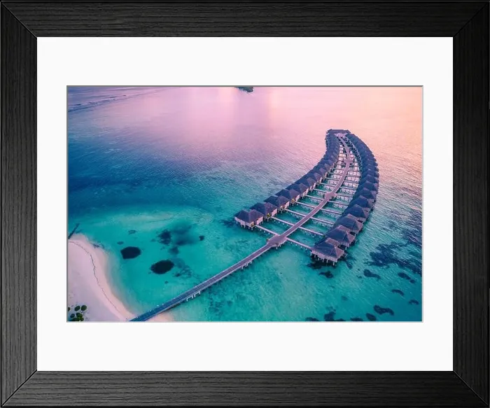 Framed Print : Drone photo wooden water villas seen from above and an amazing blue lagoon crystal clear water close to tropical lagoon. Amazing summer Framed Print : Drone photo wooden water villas seen from above and an amazing blue lagoon crystal clear water close to tropical lagoon. Amazing summer