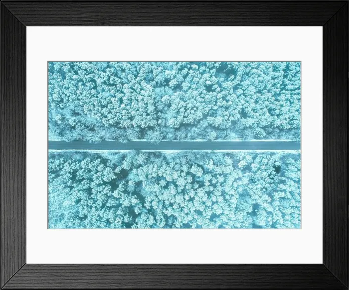 Framed Print : Aerial view of highway road through snow blue forest landscape in winter. Toned photo. Top view flat view of highway motorway freeway from high Framed Print : Aerial view of highway road through snow blue forest landscape in winter. Toned photo. Top view flat view of highway motorway freeway from high