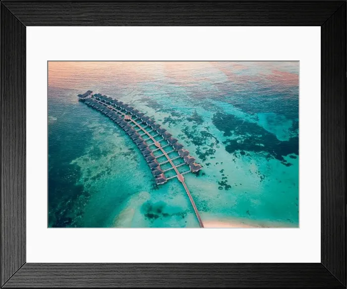 Framed Print : Drone photo wooden water villas seen from above and an amazing blue lagoon crystal clear water close to tropical lagoon. Amazing summer Framed Print : Drone photo wooden water villas seen from above and an amazing blue lagoon crystal clear water close to tropical lagoon. Amazing summer
