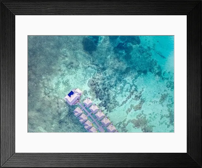 Framed Print : Amazing bird eyes view in Maldives, landscape seascape aerial view over a Maldives. Landscape, luxury tropical resort or hotel with water villas beach Framed Print : Amazing bird eyes view in Maldives, landscape seascape aerial view over a Maldives. Landscape, luxury tropical resort or hotel with water villas beach