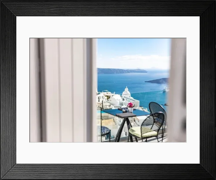 Framed Print : Romantic two chairs and a table on the terrace, Santorini island Greece. Summer vibes with white architecture and sea view. Luxury travel background Framed Print : Romantic two chairs and a table on the terrace, Santorini island Greece. Summer vibes with white architecture and sea view. Luxury travel background