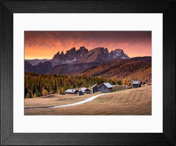 Framed Print : Incredible red sunset at Fuchiade valley in Italian Dolomites countryside. Wooden huts, orange larches forest Framed Print : Incredible red sunset at Fuchiade valley in Italian Dolomites countryside. Wooden huts, orange larches forest