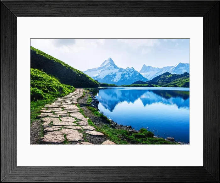 Framed Print : Picturesque view on Bachalpsee lake in Swiss Alps mountains. Snowy peaks of Wetterhorn, Mittelhorn and Rosenhorn on background Framed Print : Picturesque view on Bachalpsee lake in Swiss Alps mountains. Snowy peaks of Wetterhorn, Mittelhorn and Rosenhorn on background