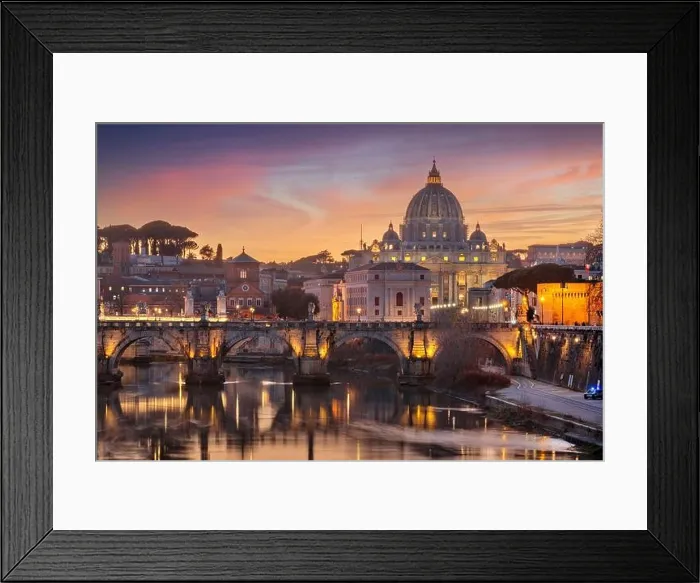 Framed Print : St. Peter's Basilica in Vatican City on the Tiber River through Rome, Italy at dusk Framed Print : St. Peter's Basilica in Vatican City on the Tiber River through Rome, Italy at dusk