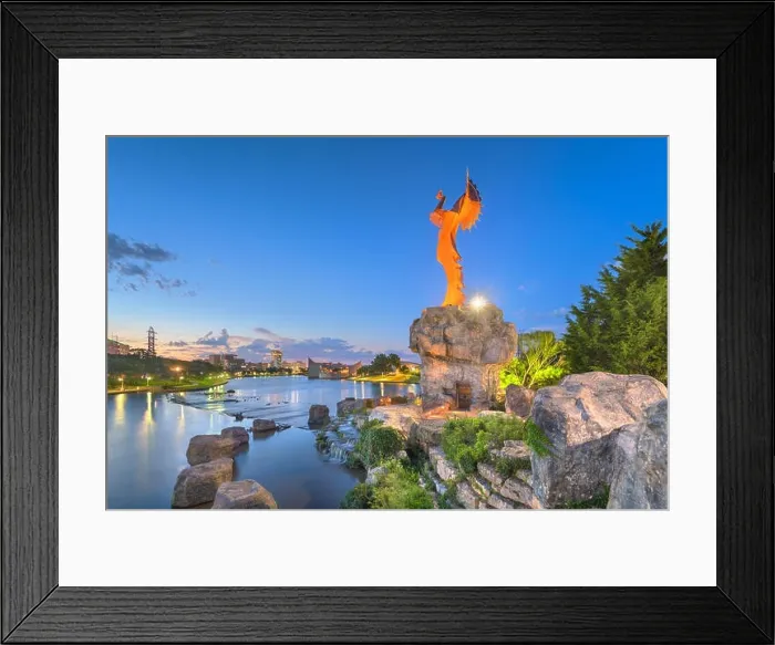 Framed Print : WICHITA, KANSAS - AUGUS 31, 2018: The confluence of the Arkansas and Little Arkansas River at the Keeper of the Plains near downtown Wichita at dawn Framed Print : WICHITA, KANSAS - AUGUS 31, 2018: The confluence of the Arkansas and Little Arkansas River at the Keeper of the Plains near downtown Wichita at dawn