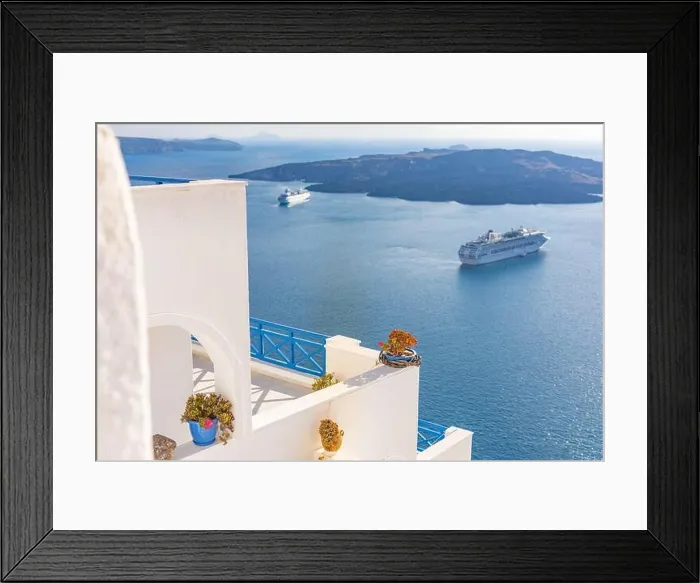 Framed Print : Peaceful view in Santorini, Greece with white architecture and flowers, cruise ships, Mediterranean summer mood, vacation and travel background Framed Print : Peaceful view in Santorini, Greece with white architecture and flowers, cruise ships, Mediterranean summer mood, vacation and travel background