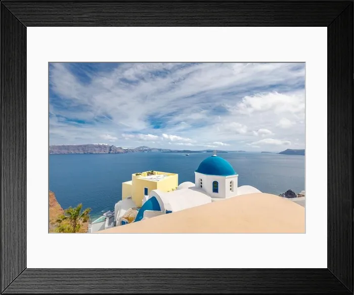 Framed Print : Blue dome in Santorini, Fira. Summer vacation landscape, peaceful sea view and volcanic cliff. Caldera view, cloudy sky Framed Print : Blue dome in Santorini, Fira. Summer vacation landscape, peaceful sea view and volcanic cliff. Caldera view, cloudy sky